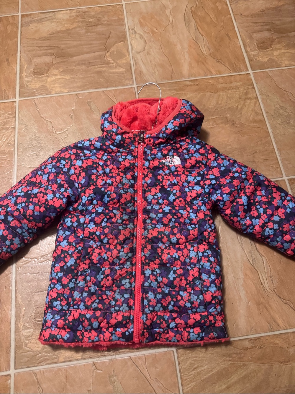 The North Face Girls' Floral Puffer Jacket in Navy & Coral.  Reversible.